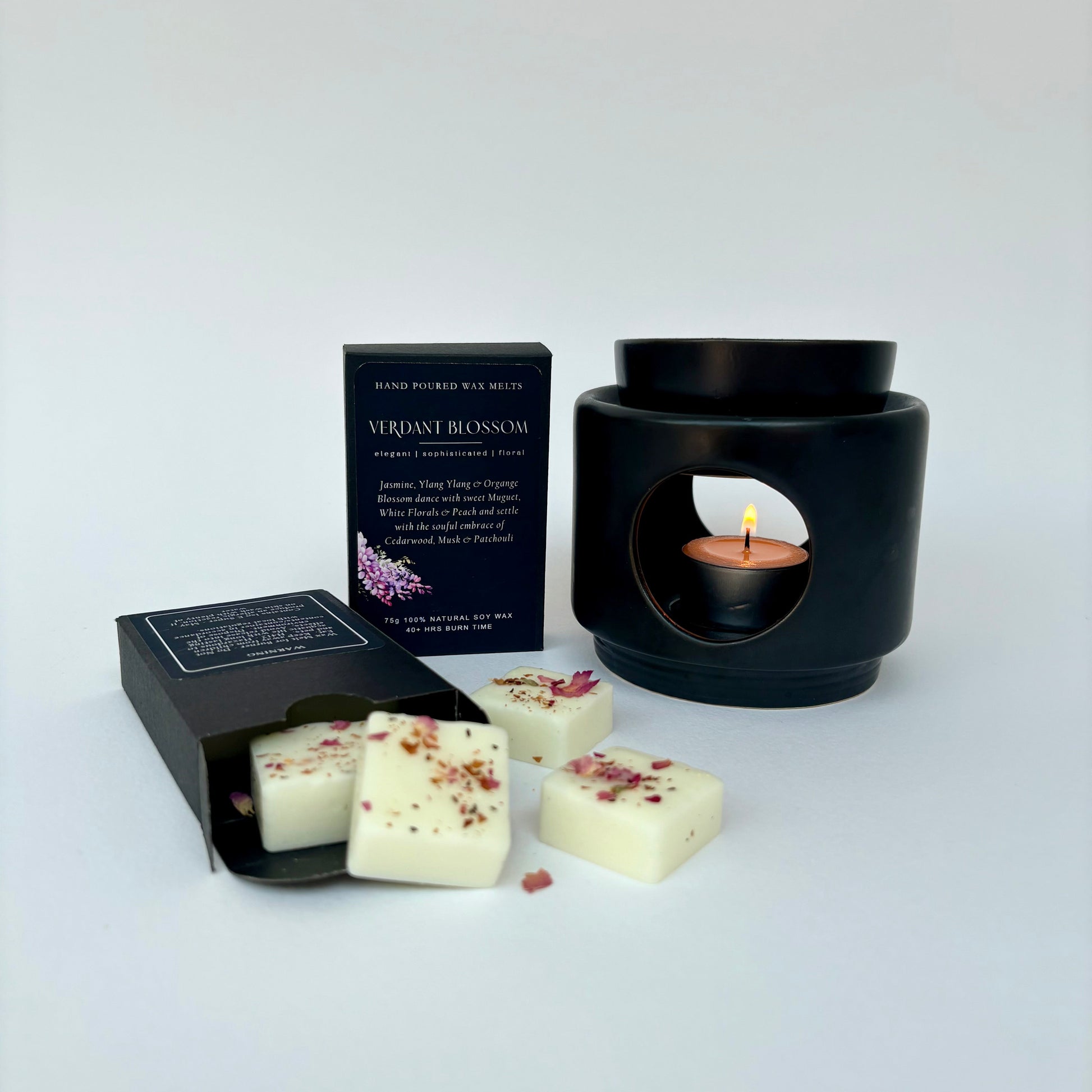 Black wax melt burner with 2 boxes of Verdant Blossom wax melts from Juniper & Wild