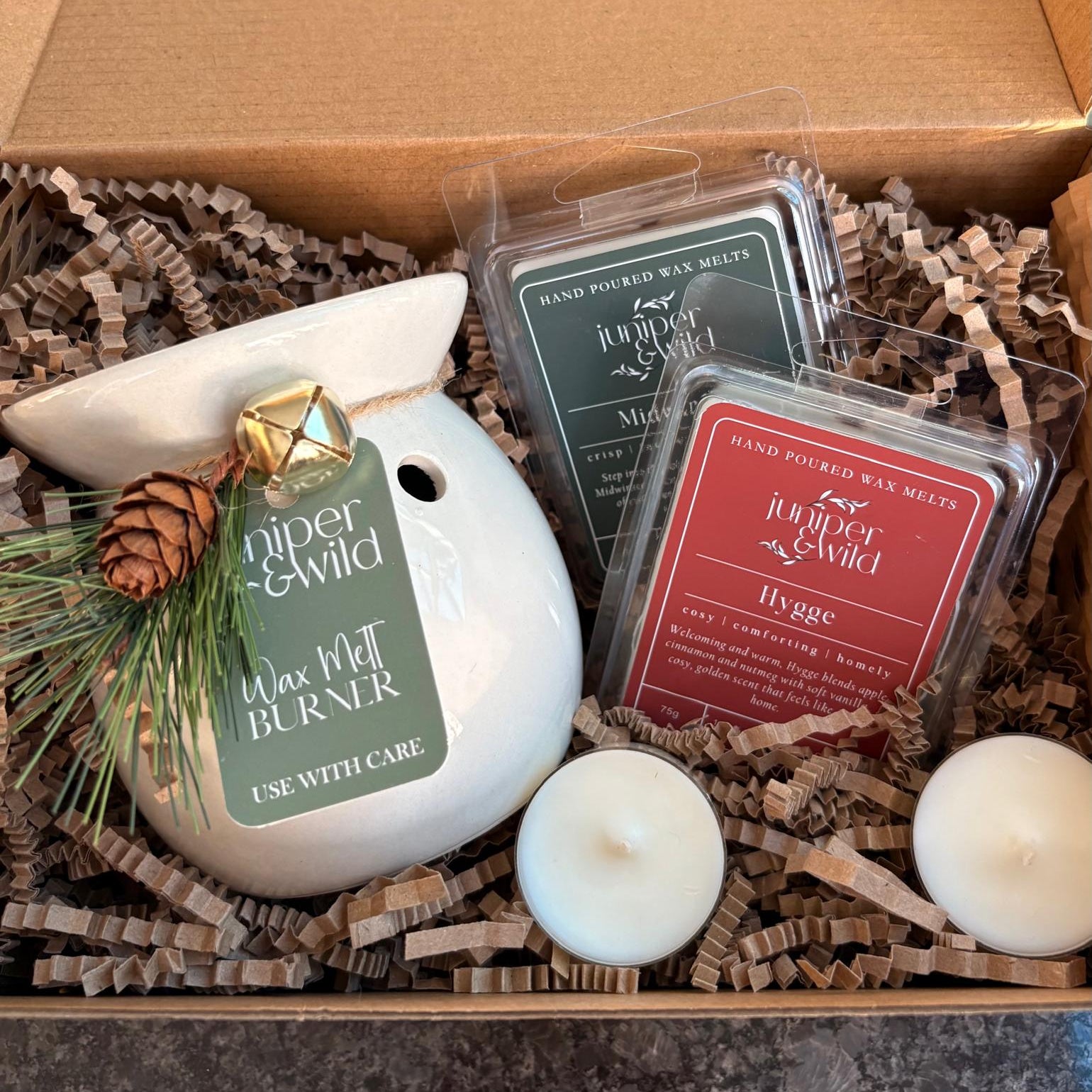 Wax melt burner set with wax melts and candles in a box